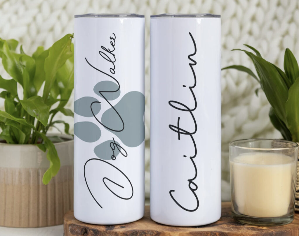 white tumblers with personalized name, labeled dog walker