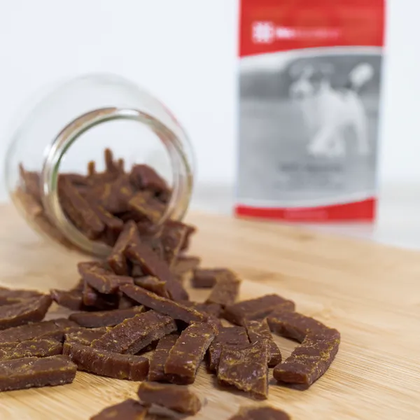display of Life's Abundance Tasty Rewards Nutritional Treats halfway poured out of tipped over jar